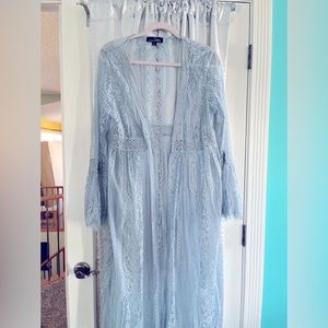 Ladies lace cardigan/ wrap , light blue with waist area enhanced